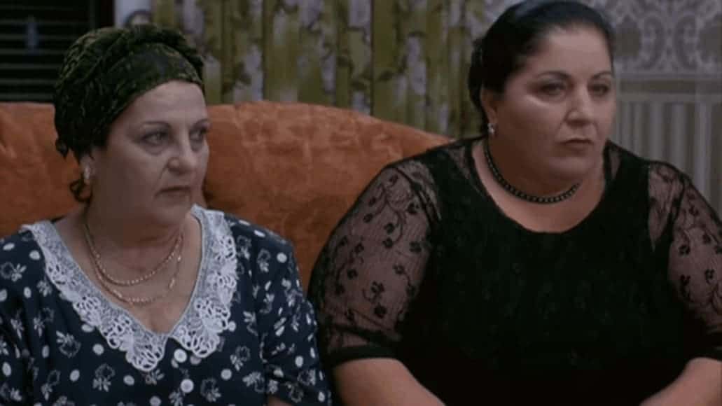 to the right, director's real-life mother Lili Kohashvili in the role of Zaza's mother.