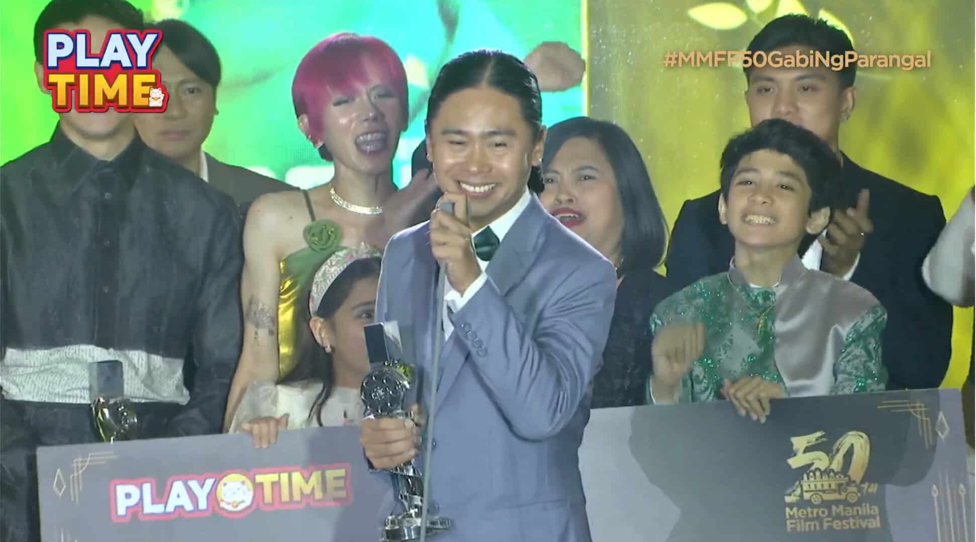 Zig Dulay receiving the award for Best Movie at the 2024 MMFF