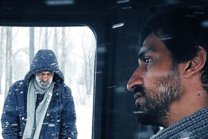Cold Sigh two men in the snow