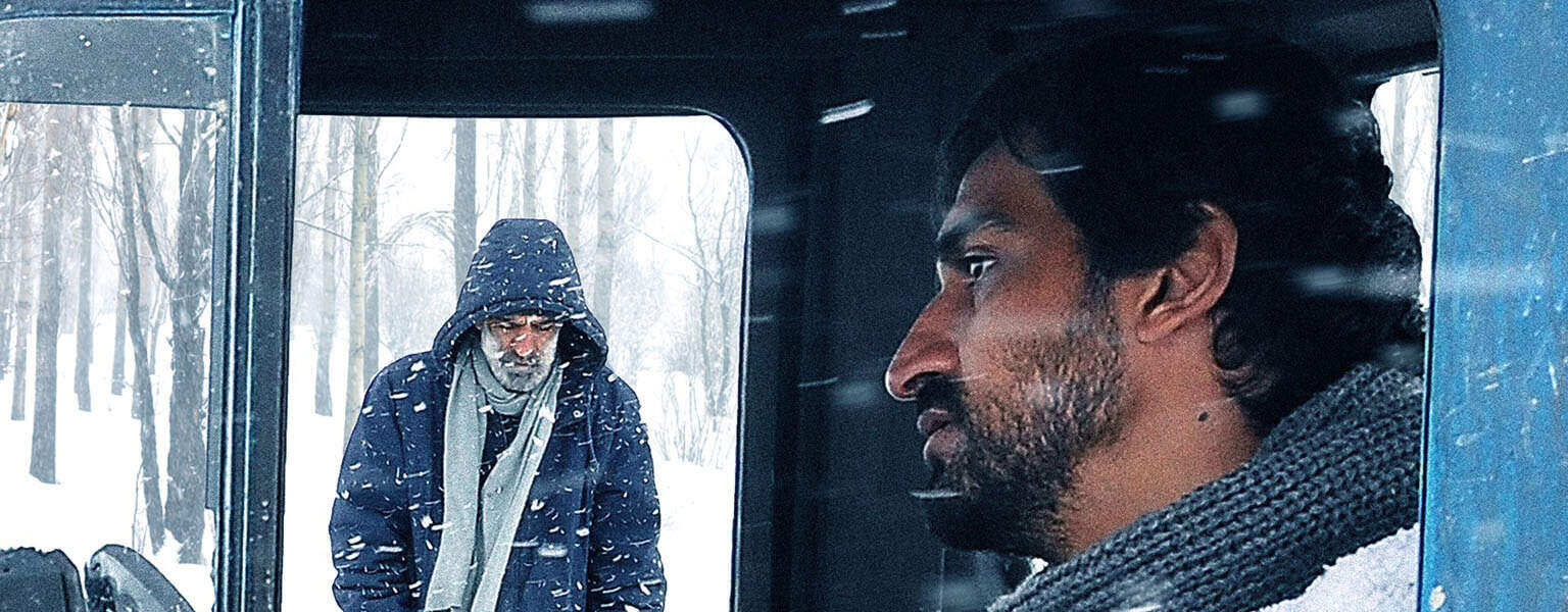Cold Sigh two men in the snow