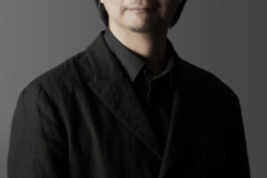 Keishi Nagatsuka is the current Artistic Director of KAAT Kanagawa Arts Theatre, a prominent performing arts venue in Yokohama, Japan. He has made significant contributions to the Japanese theater scene, curating, overseeing, and launching a wide range of performances. Under his direction, KAAT has become known for its innovative programming, including contemporary theater, international collaborations (recently 'Confessions of a Shinagawa Monkey', 'Shut Up Womb' in December 2024), and a focus on both established and emerging artists. In 1996, he launched the theatre production unit Asagaya Spiders. Their plays: 'DOGDAYS' (2000/2006), 'Working Men' (2004/2016), 'Sakurahime' (2011), 'Ageing and Architecture' (2021) have been known for their distinctive focus on narrative and deep exploration of human relationships and challenging traditional narrative structures. Currently he is active as a playwright, director and actor. His recent productions in KAAT are: 'Chikamatsu Love Suicides' (2021), 'Women of the Night' (2022) and the latest work ‘The Flower and the Dragon’ (2025). In the film industry circuit, he is known for his roles in: 'tokyo.sora' (2002), 'Realism no Yado' (2003), 'Hanagatami' (2017), 'Shin Ultraman' (2022). His father is the prominent actor Kyozo Nagatsuka. You've been serving as the third artistic director of the arts theater for about four years now, but specifically, what was the background behind becoming the artistic director of KAAT Kanagawa Arts Theatre Theater? As far as I know, you are one of the youngest among the artistic directors in Japan, which I find truly impressive. My relationship with this theater is extensive. The theater opened in 2011, and in its very first program that year, I performed a piece called ‘Buoy’ by Juro Miyoshi in the large studio. In a way, I was one of the first artists to use this theater, right from its inception. Since then, I have worked at this theater, especially on solo projects, the Kuzukawa Shichosha, which presented many works by Juro Miyoshi. Later, when Akira Shirai became the Artistic Director, I have had the opportunity to direct a variety of works, which includes works by Pirandello, Arthur Miller and Matsuyo Akimoto, and even to write scripts for some of Shirai’s productions, based on Ray Bradbury and Strindberg’s novels. These experiences were valuable for me. Not only did I gain the opportunities to encounter and direct new works that I had never come across before, but I was also able to be involved in writing scripts, which contributed to my accumulated experience. In addition, I was able to discuss the incorporation of new creative processes. Because of these kinds of various relationships, I myself had many opportunities to talk with former artistic director Akira Shirai and the theatre staffs about the theatre itself, and I think that may have been one of the reasons I was asked to become an artistic director. I must admit that I visit KAAT and attend various theater performances, but in these four years, I feel that a lot has changed, and there are two major innovations. One is that, undoubtedly, KAAT has become a bridge between the West and the East, and the other is that the surrounding area, or—so to speak—the town itself has become more integrated with the theater. Was it your time in London that pushed you toward Europe? I’m not sure exactly how much influence European theater has had on me, but I did have significant experience. Specifically, I spent about three months training and observing at the National Theatre’s research and development center, ‘Studio’. In Japan, rehearsals typically last 40 or 50 days, and once the first day of the performance begins, the production runs until the final show and then ends. That’s fine, but I found myself becoming more and more interested in whether it would be possible to spend more time on the creative process and to nurture the finished work for a longer period of time. This idea was a significant discovery for me as a creator. I thought that Japanese theatres, for example, national ones like the National Theatre, should be more proactive in taking the time for such creative processes. When I returned to Japan, I began to believe there should be more support for the arts from various levels of government, both national and local. I started reaching out more actively, meeting with producers from the National Theatre and the Setagaya Public Theatre, urging them to support workshops and create new works. I also advocated them to produce works aimed at children. I came to understand that we, as creators and professionals in this field, should be more conscious of the importance of public institutions producing theater. We, as professionals, must be aware of our responsibility to ensure that not only the audience, but also people in the community should certainly have access to theater. This is something I’ve thought a lot about since then. There is a long-standing debate on nature versus nurture. I would like to ask about your upbringing. I presume, your father must have been an indisputable inspiration. I think it’s quite significant. I have had many opportunities to watch films. I started watching movies around the age of three. Since my parents were separated early, I would spend weekends with my father and watch a lot of movies, I think it was every other weekend, which became part of my childhood routine. I believe this had a significant influence on me. My father was into American cinema, while my mother liked both European and Japanese films. This kind of environment was likely a major influence. And there was one more thing. As my mother worked hard to raise two children, I spent a lot of time alone as a child. My sister was a bit older, so I often played by myself. That may have become a good catalyst for creativity. I was absorbed in playing with dolls, and as a child I was expanding my world just like the movies. I had the pleasure of seeing your works at KAAT and Asagaya Spiders, and I noticed that you’ve directed some classic plays, including sewa-mono, as well as classic stories that have been revisited by contemporary authors. I think you’ve done a great job of reinventing each piece. Could you share a bit about the process of updating these traditional pieces, as well as your approach to choosing works for adaptation? For instance, with works like ‘Chikamatsu Love Suicides’ by Matsuyo Akimoto, even though she was a postwar writer, her works still resonate with today’s audience. I think one of the reasons why these works, created in the 1980s, remain relevant is because I myself breathed the air of that time. As we are in the same era, I feel we can continue with that same atmosphere in a sense. I interpret and present the work; there would be a sense that the past and the present are connected through me. Why is it important to revive classics today? Artists like Matsuyo Akimoto, who have been creating modern interpretations of classical works for decades, have laid a foundation for us. I believe we, in turn, can carry on that tradition and give it our own new, contemporary sensibility. It's not about merely preserving the past but about connecting it to the present. In Akimoto’s works, even though people may change over time, there’s a sense that fundamentals remain connected. It's like holding a flame, that must not be extinguished with both hands to protect it from the wind. That sense also exists in the works of Chikamatsu, where the essence of what was written continues to resonate through time. Speaking of Chikamatsu, I went to see the bunraku adaptation and was deeply moved by its power of the puppets. The dynamism of those puppets, how they seemed to almost come to life, especially when angered, was very impactful. It made me think, "This is something contemporary theatre could never replicate," and it felt like a huge challenge to take on. ‘Chikamatsu Love Suicides’ is deeply rooted in classical theatre. I thought recomposing it with a modern approach would not only preserve its historical context, but also its deep, lasting foundation. ‘Chikamatsu Love Suicides’ is a work that has been performed for a long time by Yukio Ninagawa, one of Japan's leading directors. And it has been performed spectacularly in large theatres with numerous casts. So, there were some people who were suspicious about what I was going to do with such a monumental work. But I think it’s important for us to have the mindset that it’s okay to take on such challenges and attempt things on this scale. Japanese directors tended to shy away from Japanese works, but I feel that in recent years there has been a growing awareness that we still have a rich treasure of plays in Japan that we should explore and bring to the forefront. Whether it’s Matsuyo Akimoto, Junji Kinoshita, or even Juro Miyoshi, I think we are fundamentally connected to those kind of works. Breathing new life into these outstanding Japanese plays with new direction will not only help us to recognize the fact that we have had great playwrights, but also contribute to the pride of the Japanese theater world. I was quite astonished and impressed that you turned ‘Women of the Night’ into a musical. I think the work by Kenji Mizoguchi caused quite a stir at the time, and I believe it is still a very delicate topic to grasp even today. Even now, when I look at it again after some time, the film is still quite provocative. The story itself is harsh, and it’s a work that delivers a strong shock. Although it had a big impact and well attended, it wasn’t highly evaluated as a work of art. However, what I realized again was that there is no clear historical awareness of Japan’s post-war occupation within us as Japanese people. We weren’t really taught about this in our education. We were taught something that was neither here nor there, and we grow up without a clear understanding. At least that was the case with my history education when I was in elementary school. From the period under the unification of nationalism, everything turned upside down. We were under occupation, and our values were completely overturned. What was right yesterday was suddenly turned wrong today, and the children witnessing this transformation were particularly confused, asking, “What is this?” They might have wondered, “What was I believing in? What was I taught until today? Was it all a lie?” And they’d be told, “Eat up, you are at war too!” But as soon as Japan lost the war, the weak were deprived of food for survival. Many children starved. We didn’t grasp that period of history. I’ve always thought that maybe, at the level of the common people, there is a way to capture that point of view. The era of occupation, the shock of the defeat was something I wanted to explore from various perspectives. The film, which has a high documentary quality, let me realize that one of those perspectives, though it is somewhat radical, is that of the women who stood in the streets at night, known as ‘pan-pan girls.’ It wasn’t just about living backwards for survival; there were also women who stood there feeling freedom. I wondered if it would be possible to depict them, including such ambiguities. It’s a very complex subject, but I thought that perhaps this approach could be taken in order to understand post-war Japan from the perspective of ordinary people. Actually, I saw this film quite a while ago and at that time I was so struck by it that I instinctively thought that it is in the form of a musical that could possibly be adapted for stage. So I immediately consulted Kiyoko Ogino, a musician I trust. At first she was surprised by the extremely dark subject, but I told her that I actually wanted to work on this piece as part of the production line-up of the Kanagawa Arts Theatre, and then she too began to came up with a lot of ideas. The setting must be at that post-war period; without its intensity and rawness, the confusion and upheaval of the years after war would be lost. The harsh effects of defeat come first to the weak. That's why I wanted to keep a low profile and not do it in a contemporary setting. But even in such a life, of course, there were some days when they laughed and felt happy. We tried to turn that kind of realism into a musical. Incidentally, I don’t think it’s just a mere coincidence that at the same time ‘The White Guard’ is being staged at The New National Theatre; Keralino Sandorovich is directing ‘The Cherry Orchard’ at The Setagaya Public Theatre; The National Film Archive of Japan is organizing Andrzej Wajda’s retrospective. All these, alongside ‘Hanagatami’, allude to much bigger conflict. I believe the Japanese still haven’t fully processed the aftermath of the war; the recognition of being a defeated country, the fact that we were under occupation, and the unsolved situation in Okinawa. The structure of victors and defeated nations hasn’t changed, and the struggle over it continues even now. The war is still ongoing in a sense. We can’t escape from this issue. It’s not that every play I create deals with this theme, but as an artist and creator, it’s difficult to separate myself from it. Not all my works address this. But even when I create works for children, I am always conscious of the fact that I have to depict, whether directly or not, depending on the situation, that human beings are creatures of conflict. There is always competition in this world. Though it may be part of our fate, I inevitably think about mistakes—about human issues and behaviors that are wrong but can’t be stopped. The time I spent with director Nobuhiko Obayashi was significant. In his later years, I have had many opportunities to hear his words. It was about war. He made it clear that we must not forget that. His films always depict the war in mind in some way. That reminds me, when I was in elementary school—I went to an ordinary public school in Sendagaya, Shibuya—the teacher in my first and second grades, for some reason, repeatedly showed us footage of the atomic bomb. It was probably far too early for us. Of course, this had a traumatic effect on me. I felt that I was a bad child if I didn’t face this issue, and every August, the atomic bomb documentaries would air, and when I happened to come across such a program when I turned on the TV, I couldn’t turn it off. I felt it was wrong to turn it off, so I kept watching. The atomic bombings of Hiroshima and Nagasaki remained in my mind and had a lasting impact on my work. In junior high school, I was taught about the Unit 731 of Japan, which conducted human experiments, and how Japan had committed such horrific and secretive acts. The teacher at the time said, “This might not come up later in education, so remember this," and shared the information in our last class before graduation. ‘Hanagatami’ serves as a memento of the youth of those who desperately tried to survive during the wartime era. I still cannot get the Dazai-esque lines the director added to Kira’s character out of my mind: “What will eat us in the end?”. There is something deeply unsettling about that scene. If there was a line that came to mind during filming, Nobuhiko Obayashi would simply keep adding them. I didn’t really have many additional lines, but Shinnosuke Mitsushima, for example, was given quite a few new lines. Honestly, I was just trying to keep up. The process of getting involved in this film was very unique. One day, Nobuhiko Obayashi invited me to dinner in Chinatown, and it abruptly turned into the first meeting where I was introduced to the film project. They started discussing my role, but I had no idea what was going on. By the end of dinner, I was part of the cast. It felt like I had been swept into the world of film. I was introduced to the cast and crew, and the discussions naturally evolved into the roles. It was quite a chaotic process. From that time, I started to read Kazuo Dan’s ‘Hanagatami’ and Saint-Pierre’s ‘Paul et Virginie’, trying to follow the world the director was trying to create, but I still couldn’t catch up to the pace of his vision. He worked at lightning speed, constantly moving forward. I managed to grasp this world somehow, while being wrapped in this strange green rag-like outfit, holding driftwood-like cane, and having to wear a white contact lens in one eye, imported from abroad, which appeared to be clouded white. The visual elements had obviously been ripening in his mind for years. We were caught up in this whirlwind of his ideas. One thing I clearly remember being told was, "Speak the lines as quickly as possible." Other than that, I didn’t really get much more direction. It was such a surreal experience, and there was no room for normal thoughts or analysis. My wife, Takako Tokiwa, on the other hand, was more composed and trying to make sense of Obayashi’s intentions. She was a big fan of the director's films and starred in a film called ’Seven Weeks.' She was reliable, or rather a mainstay of the film. It is probably because all the other characters were set young, except for her. My character Kira was also a teenage student. As you may know, at that time when we were about to start shooting, the director revealed that he had been diagnosed with cancer. It was quite shocking. There were times when he wasn’t even on set and me, Shinnosuke Mitsushima and the crew tried to figure out what we were supposed to do without the director on board. But it was difficult to move forward without the director’s presence. It was a tough time. When the director was there, things developed all at once. It was like being in a dream of a film. Looking back, it was a once-in-a-lifetime experience. I would like to go back in time and ask about your first film project, namely 'tokyo.sora' (2002). Referring to the movie, could you tell how the situation of women changed in the industry in Japan over the past 20 years? Looking back, 'tokyo.sora', directed by Hiroshi Ishikawa, captured the real-life perspectives of women. The director aimed to gather the everyday female experience from a generation around their mid-20s. It was almost like he was a chronicler—whether in films or commercials, Ishikawa wanted to capture the authentic voices of women from that age group. He sometimes brought in people outside the acting world, to include their raw, unfiltered voices in the film. The voices captured were those of real people, with even the exhaling before the voice being recorded. This was something I felt deeply during the process. 'tokyo.sora' doesn’t have scripts; it’s entirely improvised. I also participated in long takes for several times, sometimes lasting up to an hour. It was a very unique experience. It could be called cinema verité. It is a bit different from documentaries. I saw it as a technique for building up as realistic relationship as possible in a given location; it could be lovers, sisters, a couple, or friends. In Tokyo around that year, figures like Sheena Ringo emerged, though she was somewhat of an exception. There weren’t many people with voices as loud as hers. Women's real voices were still hard to capture, and in 2002, it was probably still a situation where you had to go out and actively search for female sharp voices. While they existed, amplifying them was difficult. In this respect, her cultural impact was significant. Around the same time, there were others like Hikaru Utada, but her voice was softer, and it was different from the intensity of Sheena Ringo, but she was special too. She had such overwhelming singing talent even at a young age, and still had a relaxed presence despite her good pedigree. I felt she was a new possibility. In general, women’s roles in storytelling had been quite limited in the past, especially in Japanese theater, where male playwrights dominated. Of course, there were female playwrights who helped break down those boundaries, but I think a sense of struggle and confinement still remained. Over time, the space for women has undoubtedly grown larger. That said, while voices are getting louder and there’s a social movement to amplify them, I wonder how much actual progress has been made. It’s a positive thing to strive for equal opportunities, and a society where everyone has equal chances is undoubtedly a worthy goal. However, I believe we need to understand and proceed with this value firmly. We must not be slow, but we must also be careful not to rush. If we push too quickly, we might encounter difficulties. Achieving an equal society is a noble goal, but the way we move toward it matters. I came to think that the pace and way we progress are also crucial. But things like this are being updated every day. Anyway, it's important to move forward through dialogue, rather than just telling people what to do. Your latest theatrical production, 'The Flower and the Dragon,' is based on a famous novel by Ashihei Hino, which has been lavishly adapted for the screen. Could you please say a few words about its phenomenon? It's interesting the novel was adapted for the screen so many times. With the lead actor by Yujiro Ishihara, Ken Takakura, and Kinnosuke Nakamura, each film is very different. The story of Kingoro Tamai (the author’s father), a man straight-forward in character and strong in the arms, who hated fighting, takes place in the port area of Wakamatsu in northern Kyushu at the end of the Meiji era. The dockworkers, known as ‘okinakashi’ at the time, were rough, tough individuals, engaging in fights. The police and authorities were still weak, so it was a society of fangs and claws. Kingoro, who had come from Shikoku region with nothing but the clothes, is a progressive man who strives to improve the labor conditions for the workers. The story is about a man who, in an age when a society hasn't fully formed yet, struggled to secure the rights and dignity of the weak and the workers in harsh conditions. It’s heartening and interesting to watch as he attempts to bring fairness amidst the chaotic lives of people. Moreover, the society during this period might seem like a male-dominated one, where women were expected to take care of the household and earn low wages. However, it is said that women made up about a third of the workforce in the dock. In fact, many women worked alongside men, and the society wouldn’t have formed without them, who also took care of housework and child-rearing. From my perspective, this intricate balance of gender roles helped maintain the community. In fact, there were women among the leaders of the dockworkers at the time who were as strong and courageous as the men. The strength of women was embedded in this world. Kingoro was not a flawless man—he had affairs, and there were complications in his personal life. But despite his flaws, there was something in his character that was deeply human and noble. He had a belief in justice, or rather, in the idea that people should live with dignity. He believed everyone should live with their rights and pride. What’s even more appealing is that the elan-vital of Kingoro Tamai was later carried by the likes of Tetsu Nakamura, the humanitarian who worked in Afghanistan. There’s a strong resemblance between the two; they put others first. I hope that the straight forwarded ideals represented in Kingoro can inspire society today. That kind of commitment to one’s principles and the idea of living a life with purpose and dignity is something we can all aspire to. Lastly, I cannot resist posing you the same question as I did to Nobuhiko Obayashi. He ends ‘Hanagatami’ with an unanswered coda: “Did you manage to jump”? By no means. Well, I’ve finally come to realize where I stand. But as for the higher position, over the past four years at this theater, I’ve been thinking there must be something better, something higher—a better vantage point from which I could view things. I feel like, somehow, I’ve gradually developed an awareness of how to find that position. It isn't from above, I'm sure. I just have to stand firmly. This is because, underlying everything, there’s the idea that theater and theater spaces are necessary in society. That’s the foundation on which we stand. So, being able to properly recognize that a theater is being operated is crucial. It may seem obvious, but standing in that position and beginning to think from there—facing the audience as equals—is a significant shift I’ve experienced. As for international exchange, there was a turning point. By dedicating time and effort to working with others, we created something good, and now there’s a possibility it could go on a world tour. When the tour begins, we are already thinking about our next step. This ability to look ahead comes from the gradual accumulation of experience. Of course, I believe more international exchange in the future would be great, but we also need to proceed carefully and selectively. We must be mindful of the limited space and resources we have. It’s about identifying what truly feels right—things we can confidently select. This will become a major guiding principle. It’s not about having many things, but about choosing what truly matters. That’s the approach I believe in. I feel like we discovered that through our international collaborations. I still have a long way to go. Over these past four years, especially as the artistic director of KAAT, I focused intensely on my role. Now, I need to also re-focus on my own creative interests and decide what I should be doing next. I need to look within myself again, reflect on what needs to be done, and continue to create and direct new works. About recent international projects launched by KAAT Kanagawa Arts Theatre ‘Confessions of a Shinagawa Monkey’ A co-production between Vanishing Point and Kanagawa Arts Theatre in association with Tramway had its World Premiere in Yokohama (Japan) in late November 2024, followed by the Scottish Premiere at Tramway in February 2025, and Dundee Rep in March 2025. Based on short stories by the acclaimed Japanese author Haruki Murakami, ‘Confessions of a Shinagawa Monkey’ has been co-created by Matthew Lenton and Sandy Grierson. It will be performed in English and Japanese, with full dialogue captioning (in English and Japanese) built into the stage design and touring with the show. Featuring performers from Scotland and Japan, human and puppet monkeys, lurking shadows, stunning sound and Vanishing Point’s distinctive visual language, the show will draw audiences into the inimitable, dream-like domain of one of the world’s best-loved living authors.World Premiere: KAAT, Yokohama, Japan Fri 29 November - 8 December 2024 ‘Shut up, Womb’ The Korea National Contemporary Dance Company (KNCDC) and the KAAT Kanagawa Arts Theatre collaboration on an international co-production to present a new work by Reisa Shimojima, the leader of the cutting-edge dance company KEDAGORO. ‘Shut Up Womb’ is a piece that Shimojima was commissioned to create by KNCDC, focusing on her own physicality. It was first presented in November 2021. For the 2024 version, Shimojima re-created the piece, building upon the original work, while featuring dancers from Korea and Japan, including members of KEDAGORO, to deliver an even more grandiose new production. profile photo