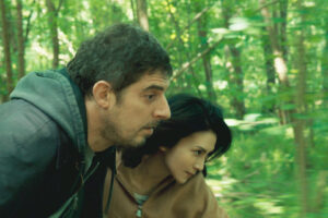 Damien Bonnard and Ko Ishibasaski in "Serpent's Path" (2024)