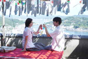 Elaiza Ikeda and Kei Adachi in a movie still for Rewrite